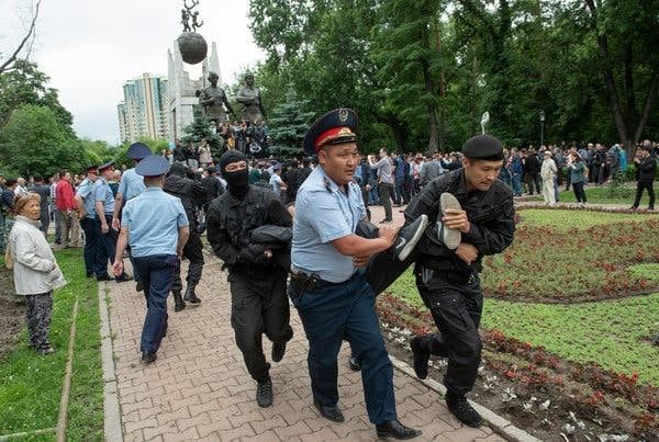Security officers in Almaty, Kazakhstan, detained demonstrators on Sunday.